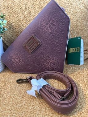 Loungefly “wicked” Embossed Triangular Crossbody Bag - Mauve